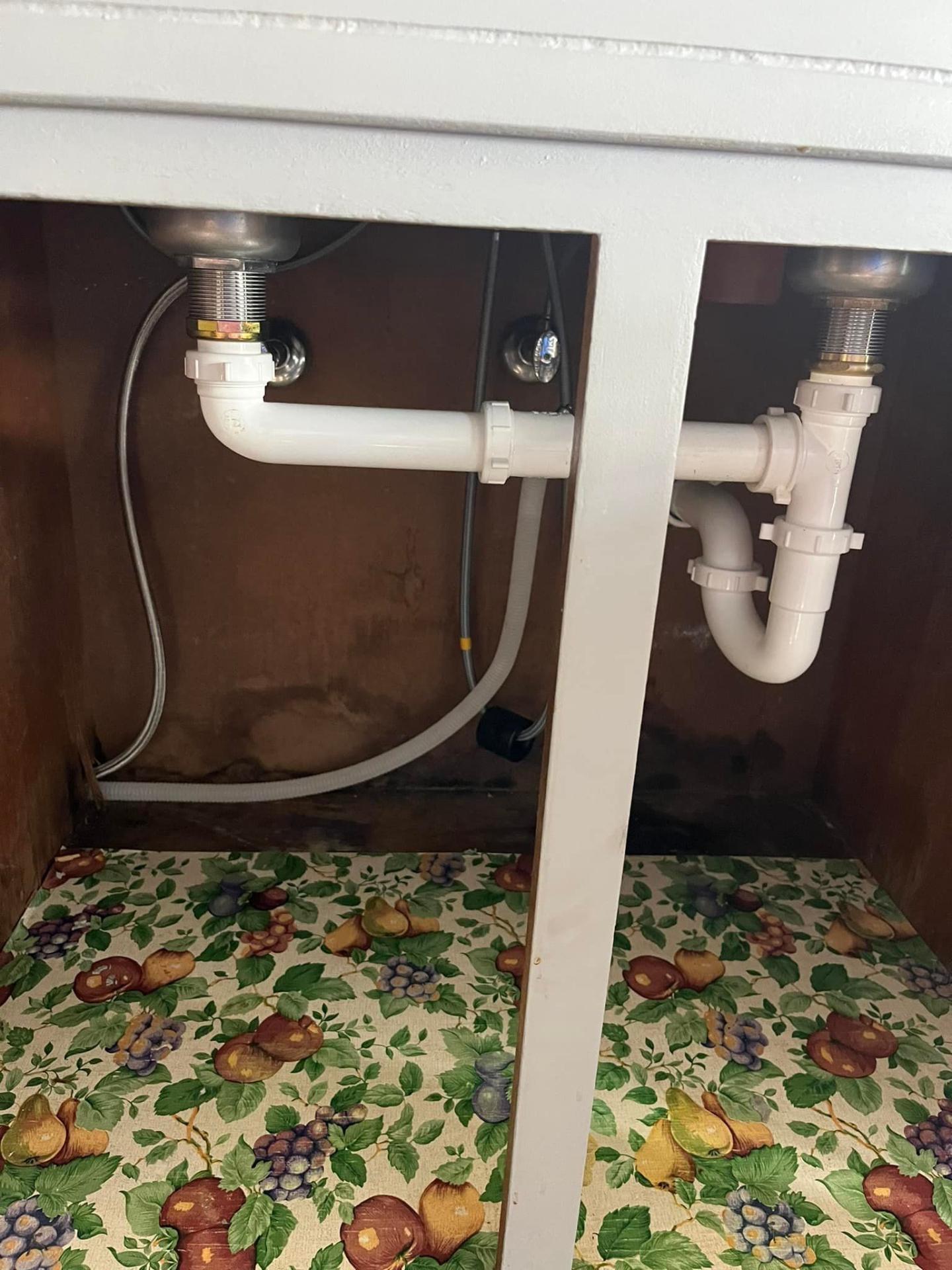 Under-sink plumbing fixture installation by Waterman Plumbing